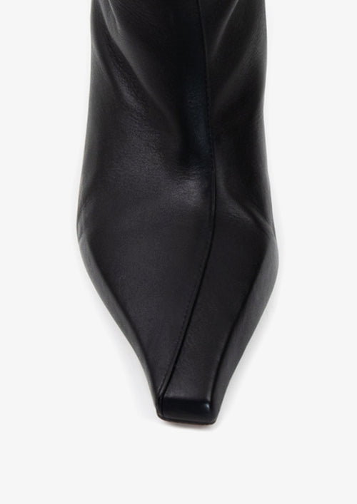 Cambre 50 Boot by Boutashkova with a split shaft and a square toe, shown from a top-down angle on a light gray background.