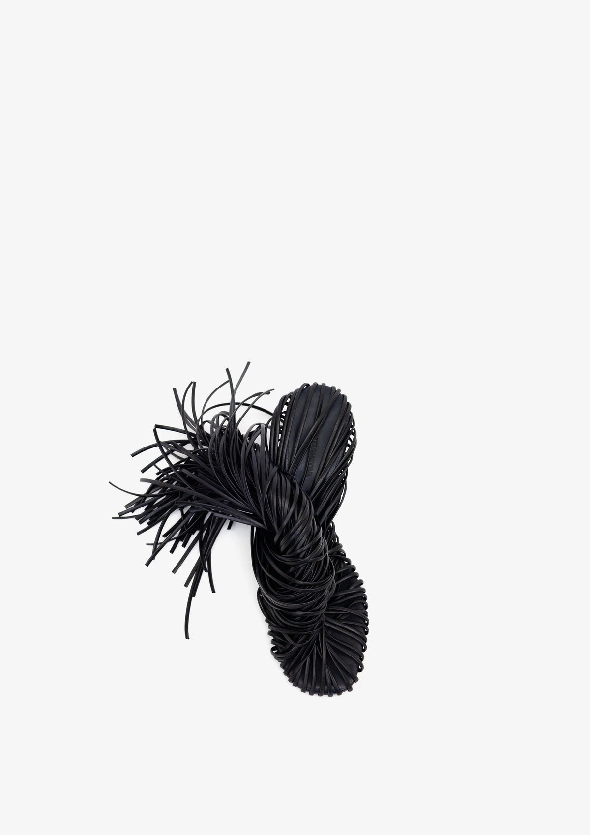 Fringe 60 sandal by Boutashkova, a single black high-heeled mule sandal with an intricate fringed strap design, shown from a side profile against a solid white background.